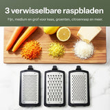 Kaasrasp met Opvangbak – RVS Groenterasp – Keukenrasp met Container – 3 Verwisselbare Raspbladen – Handrasp voor Kaas, Groenten en Citroenrasp – Antislip