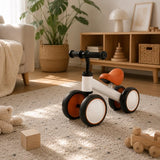 Jeemsie Loopfiets 1 Jaar – Baby Loopfiets 12 tot 36 Maanden – Vierwiel Loopfiets – Eerste Fiets voor Peuters – Binnen & Buiten – Oranje-Wit
