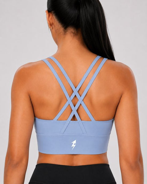 SparkNine Elevate sport-bh - M - lichtblauw - gekruiste rug - push-up effect - stevige ondersteuning - met uitneembare pads