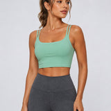 SparkNine Effortless crop top - met verwijderbare vulling - twist back - stijlvol & ademend