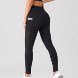 SparkNine Novaflex sportlegging dames - stijlvol & ademend - met zakken - L - zwart - mesh panelen - elastisch - squatproof