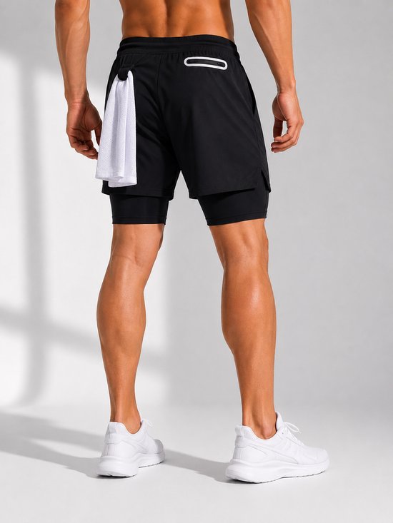 SparkNine Stridex fitness short heren - dubbellaags - met telefoonzak - M - zwart-wit - sneldrogend - met handdoeklus & zakken - functioneel & comfortabel