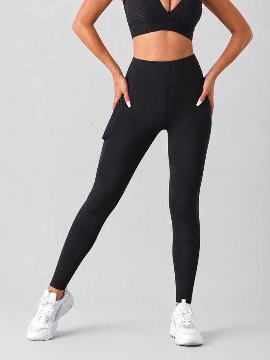 SparkNine Novaflex sportlegging dames - stijlvol & ademend - met zakken - M - zwart - mesh panelen - elastisch - squatproof