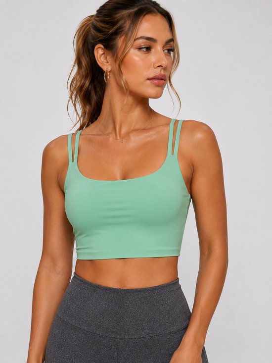 SparkNine Effortless crop top - met verwijderbare vulling - twist back - stijlvol & ademend