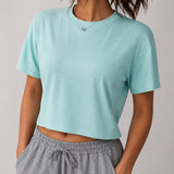 SparkNine Flow sporttop - sport t-shirt - L - groen - open rug - stijlvol & ademend - losse pasvorm - fitness top