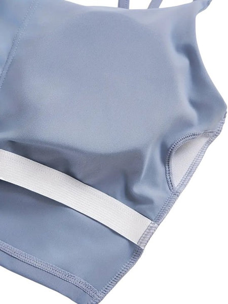 SparkNine Effortless crop top - met verwijderbare vulling - twist back - stijlvol & ademend