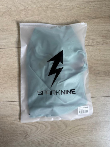 SparkNine Effortless crop top - met verwijderbare vulling - twist back - stijlvol & ademend