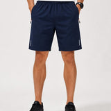 SparkNine Apex fitnesshort - sportbroek - met ritszakken - S - blauw - functioneel - sneldrogend & ademend - elastische band met trekkoord