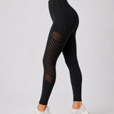 SparkNine Novabreeze sportlegging - dames - ademend - met zakken - stijlvol design - S - zwart - mesh panelen - met zakken - elastisch - squatproof