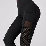SparkNine Novabreeze sportlegging - dames - ademend - met zakken - stijlvol design - S - zwart - mesh panelen - met zakken - elastisch - squatproof