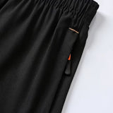 SparkNine Apex fitnesshort - sportbroek - met ritszakken - 152-158 - zwart - functioneel - sneldrogend & ademend - elastische band met trekkoord