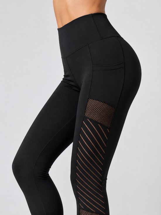 SparkNine Novabreeze sportlegging - dames - ademend - met zakken - stijlvol design - M - zwart - mesh panelen - met zakken - elastisch - squatproof
