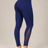 SparkNine Meshtone Sportlegging - XL - blauw - mesh details & handige zakken - sportbroek - ademend & stijlvol - elastisch - squatproof