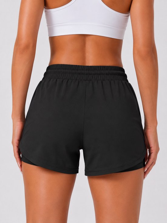 SparkNine Zipflex short dames - tweedelig - met binnenbroek & ritszakken - L - zwart - hardloopshort - elastische taille met trekkoord