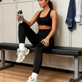 SparkNine Novabreeze sportlegging - dames - ademend - met zakken - stijlvol design - L - zwart - mesh panelen - met zakken - elastisch - squatproof