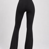 SparkNine Flowflare legging dames - petit pijplengte - superzacht - M - zwart - hoge taille - flared broek - elastisch