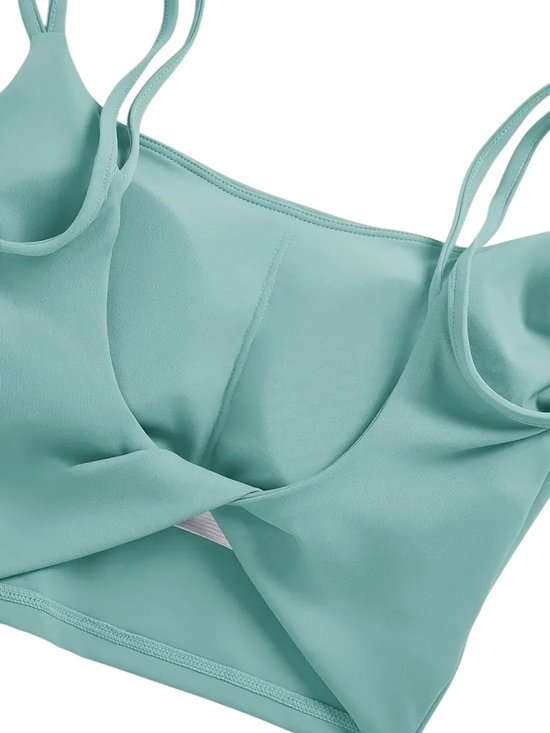 SparkNine Effortless crop top - met verwijderbare vulling - twist back - stijlvol & ademend