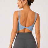 SparkNine Effortless crop top - met verwijderbare vulling - twist back - stijlvol & ademend