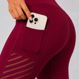 SparkNine Novawave sportlegging dames - squatproof - ademend - met zakken - L - rood - mesh panelen - elastisch & stijvol