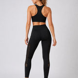 SparkNine Novabreeze sportlegging - dames - ademend - met zakken - stijlvol design - L - zwart - mesh panelen - met zakken - elastisch - squatproof
