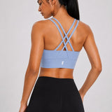 SparkNine Elevate sport-bh - L - lichtblauw - gekruiste rug - push-up effect - stevige ondersteuning - met uitneembare pads