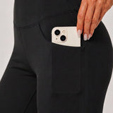 SparkNine Solara flare broek - M - zwart - hoge taille - uitlopend - voorzakken - stijlvol & comfortabel