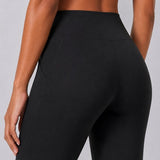 SparkNine Vivaflow flare broek dames - stijlvol V-design - M - zwart - ademend met uitlopende pijpen - sneldrogend & ademend - stretch