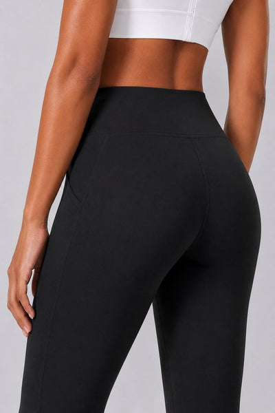 SparkNine Vivaflow flare broek dames - stijlvol V-design - M - zwart - ademend met uitlopende pijpen - sneldrogend & ademend - stretch