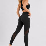 SparkNine Meshmotion sportlegging - dames - met zakken - XL - zwart - stijlvolle mesh panelen - telefoon zakken - elastisch - squatproof