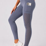 SparkNine Novawave sportlegging dames - squatproof - ademend - met zakken - S - grijs - mesh panelen - elastisch & stijvol