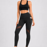 SparkNine Meshmotion sportlegging - dames - met zakken - L - zwart - stijlvolle mesh panelen - telefoon zakken - elastisch - squatproof