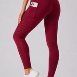 SparkNine Novawave sportlegging dames - squatproof - ademend - met zakken - XL - rood - mesh panelen - elastisch & stijvol