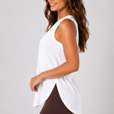 SparkNine Flexsplit tanktop - lange pasvorm - S - wit - mouwloos - met zijsplit - ademend - sporttop