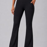 SparkNine Vivaflow flare broek dames - stijlvol V-design - S - zwart - ademend met uitlopende pijpen - sneldrogend & ademend - stretch
