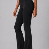 SparkNine Vivaflow flare broek dames - stijlvol V-design - M - zwart - ademend met uitlopende pijpen - sneldrogend & ademend - stretch