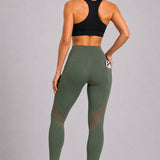 SparkNine Meshmotion sportlegging - dames - met zakken - S - groen - stijlvolle mesh panelen - telefoonzakken - elastisch - squatproof
