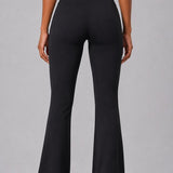 SparkNine Vivaflow flare broek dames - stijlvol V-design - L - zwart - ademend met uitlopende pijpen - sneldrogend & ademend - stretch