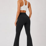 SparkNine Solara flare broek - M - zwart - hoge taille - uitlopend - voorzakken - stijlvol & comfortabel