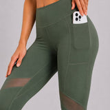 SparkNine Meshmotion sportlegging - dames - met zakken - S - groen - stijlvolle mesh panelen - telefoonzakken - elastisch - squatproof